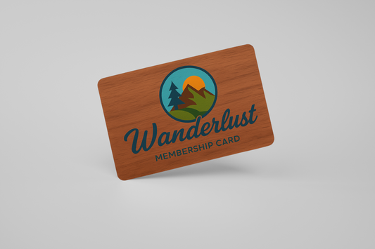 A photo of a dark RFID card in wood with a custom design