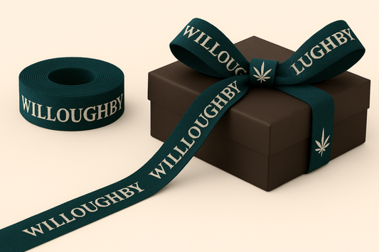 A photo of grosgrain ribbon with logo