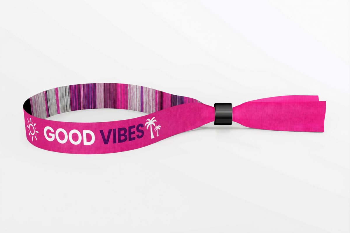 Braccialetto in tessuto intrecciato rosa con scritta Good Vibes tessuta